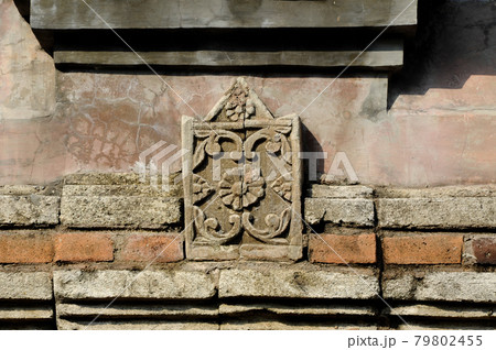 Stone work design and detail at Stone carving work with Javanese and Hindu influences. Located in the Old Grand Mosque of Mataram Kotagede, Jogjakarta Indonesia. Was build circa 1575. Stone work design and detail at Stone carving work with Javanese and Hindu influences. Located in the Old Grand Mosque of Mataram Kotagede, Jogjakarta Indonesia. Was build circa 1575. 79802455
