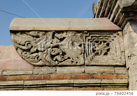 Stone work design and detail at Stone carving work with Javanese and Hindu influences. Located in the Old Grand Mosque of Mataram Kotagede, Jogjakarta Indonesia. Was build circa 1575. Stone work design and detail at Stone carving work with Javanese and Hindu influences. Located in the Old Grand Mosque of Mataram Kotagede, Jogjakarta Indonesia. Was build circa 1575. 79802456