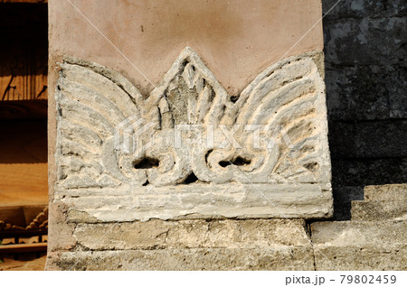 Stone work design and detail at Stone carving work with Javanese and Hindu influences. Located in the Old Grand Mosque of Mataram Kotagede, Jogjakarta Indonesia. Was build circa 1575. 79802459