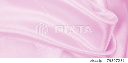 Smooth elegant pink silk or satin texture as wedding background. Luxurious background design Smooth elegant pink silk or satin texture as wedding background. Luxurious background design 79807281