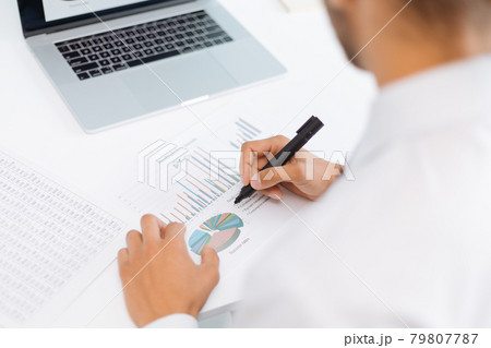 business man analyzing financial data . rear view. business man analyzing financial data . rear view. 79807787