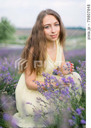Beautiful girl on the lavender field 79807848