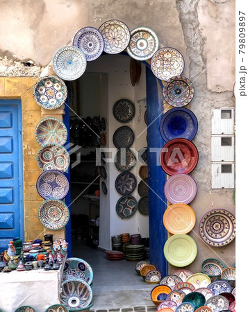 Colorful ceramics and pottery displayed outside in the market. Colorful ceramics and pottery displayed outside in the market. 79809897