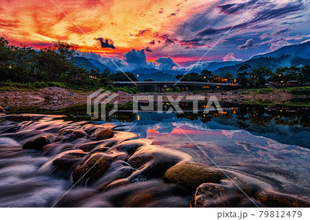 Landscape image of brook and rocks in the valley at Kiriwong village, Nakorn Sri Thammarat, Thailand. Landscape image of brook and rocks in the valley at Kiriwong village, Nakorn Sri Thammarat, Thailand. 79812479