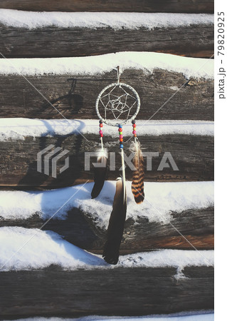 Dream catcher with sunset on the background Dream catcher with sunset on the background 79820925