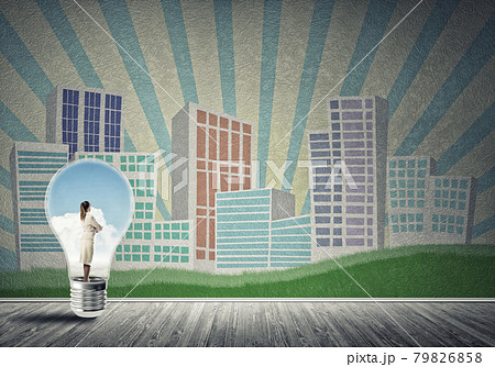 Businesswoman trapped in bulb Businesswoman trapped in bulb 79826858