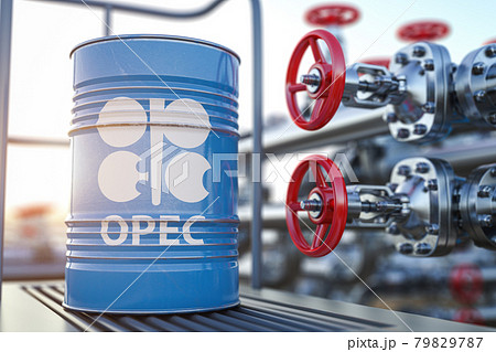 Opec symbol on the oil barrel and oil pipe line valve in front of the barrels. 79829787