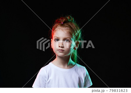cute redhead little child girl on black background. cute redhead little child girl on black background. 79831623