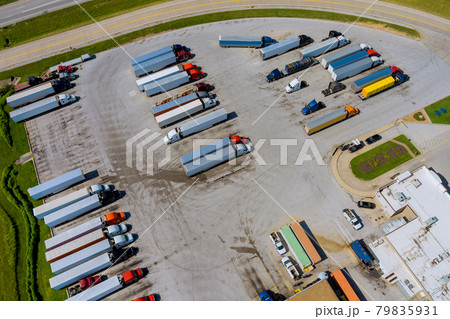 Aerial view of transportation station with truck stop near interstate highway Aerial view of transportation station with truck stop near interstate highway 79835931