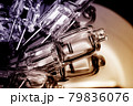 Several halogen small incandescent lamps with a blurry background 79836076
