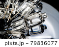 Several halogen small incandescent lamps with a blurry background 79836077