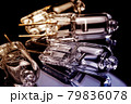Several halogen small incandescent lamps with a blurry background 79836078