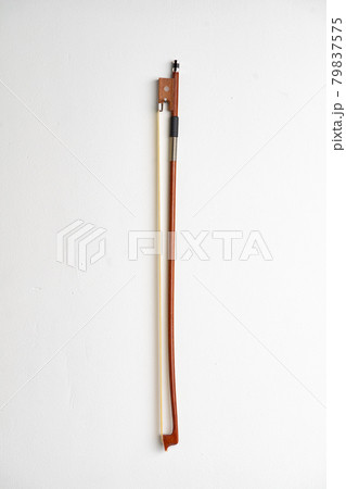 Cello bow isolated over a white background Cello bow isolated over a white background 79837575