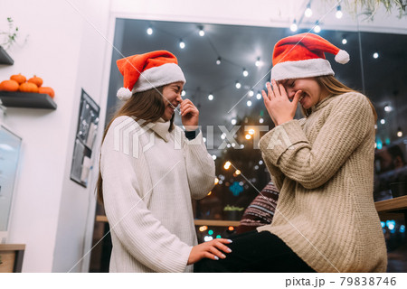 Portrait of happy cute young friends having fun in cafe 79838746