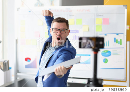 Emotionally motivated male coach conducts online business training 79838969