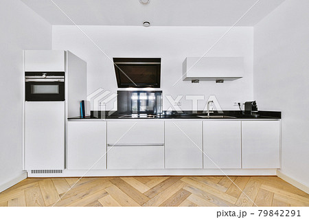 Interior of a beautiful kitchen of an elite house Interior of a beautiful kitchen of an elite house 79842291