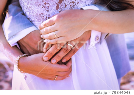 Wedding wedding couple with hands together holding hands. 79844043