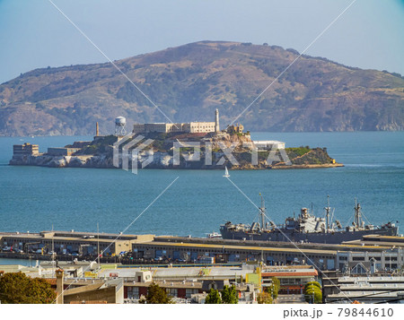Sunny view of the Alcatraz Island and San Francisco Bay with some residence building 79844610