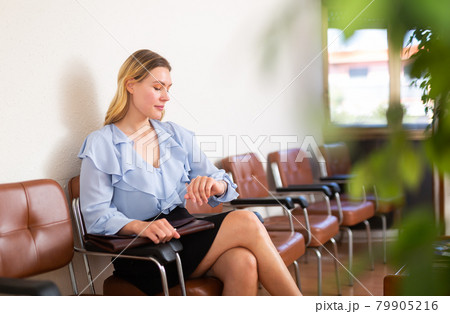 Woman waiting for job interview at office Woman waiting for job interview at office 79905216