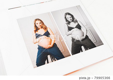 top view. photobook from photo shoot pregnancy. top view. photobook from photo shoot pregnancy. 79905366