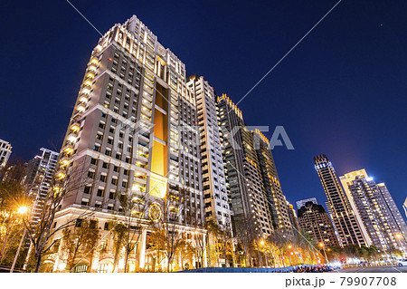 Low angle of view of the modern architectural landscape at night in Taichung, Taiwan. Low angle of view of the modern architectural landscape at night in Taichung, Taiwan. 79907708