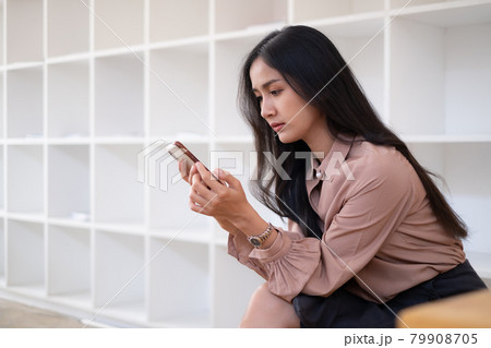 A businesswoman completes KYC using an online banking program in order to open a digital savings account. The definition of cyber security. 79908705