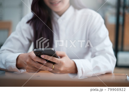 A businesswoman completes KYC using an online banking program in order to open a digital savings account. The definition of cyber security. 79908922