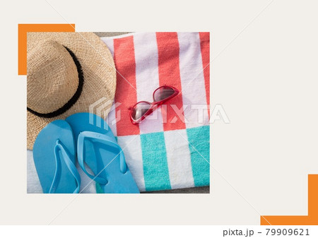 Photograph of flip flops, sunglasses and starfish against grey background Photograph of flip flops, sunglasses and starfish against grey background 79909621