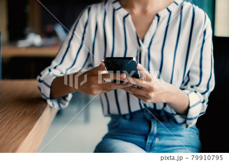 A businesswoman completes KYC using an online banking program in order to open a digital savings account. The definition of cyber security. A businesswoman completes KYC using an online banking program in order to open a digital savings account. The definition of cyber security. 79910795