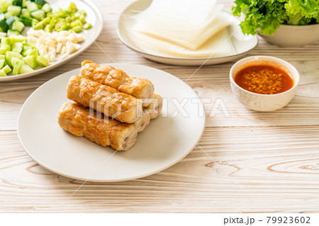 Vietnamese pork meatball with vegetables wraps (Nam-Neaung or Nham Due) Vietnamese pork meatball with vegetables wraps (Nam-Neaung or Nham Due) 79923602