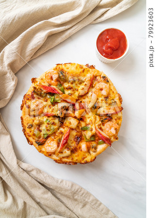 seafood pizza on wood tray 79923603