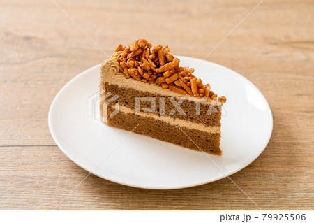 coffee almonds cake on plate 79925506