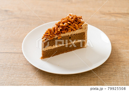 coffee almonds cake on plate 79925508