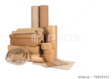 Set of different cardboard boxes, rolls of paper, paper edge protectors and tubes, sheets of paper and cardboard isolated for your presentation, catalogue or website. Sustainable packaging concept Set of different cardboard boxes, rolls of paper, paper edge protectors and tubes, sheets of paper and cardboard isolated for your presentation, catalogue or website. Sustainable packaging concept 79929352