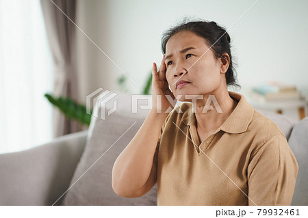 Exhausted tired depressed stressed thoughtful mature senior woman suffering from headaches, Brain diseases, mental problems, Alzheimer Concept. 79932461