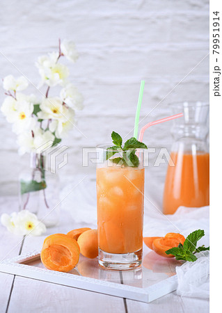 non-alcoholic cocktail made   apricot juice 79951914