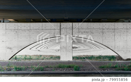 Supporting structure made of concrete from a large bridge, geometric form from pointed ovals in central perspective, abstract 79955856