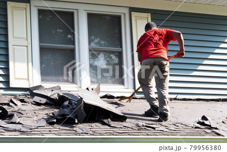 Contracter on removing shingles on a roof Contracter on removing shingles on a roof 79956380