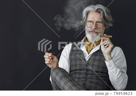 Handsome pensive mature businessman in formal suit Handsome pensive mature businessman in formal suit 79959623