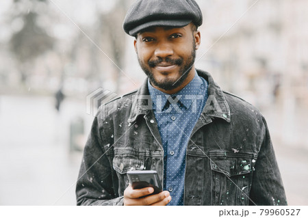 Outdoor portrait of an African business man Outdoor portrait of an African business man 79960527