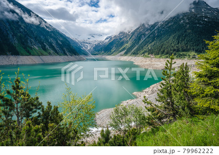 Schlegeis Stausee lake view from mountain hiking path trail. Zillertal, Austria, Europe Schlegeis Stausee lake view from mountain hiking path trail. Zillertal, Austria, Europe 79962222