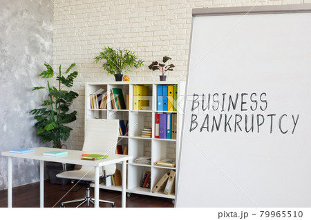 Empty office and words Business bankruptcy on the whiteboard. 79965510