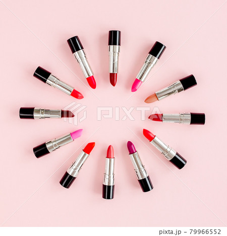 Set of color lipsticks on pink background. Professional decorative cosmetics, product pomade. Flat composition beauty, fashion. flat lay, top view Set of color lipsticks on pink background. Professional decorative cosmetics, product pomade. Flat composition beauty, fashion. flat lay, top view 79966552