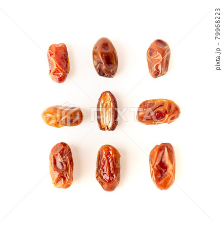 Dried dates isolated on white Dried dates isolated on white 79968223