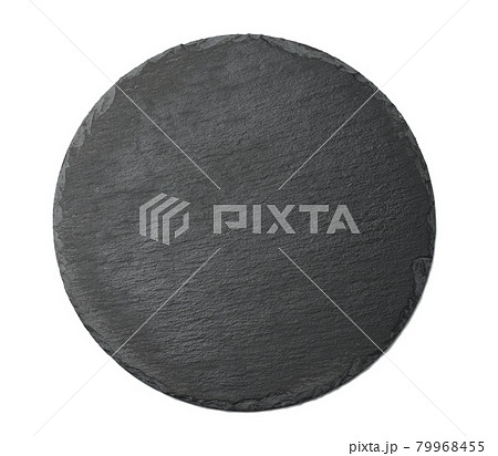 empty black round graphite board for serving dishes isolated on white background empty black round graphite board for serving dishes isolated on white background 79968455