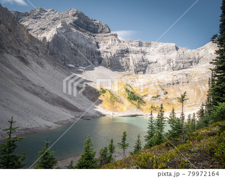 Fall in Canadian Rockies, colorful valley with mountain and lake, shot on Galatea Lakes trail in Kananaskis, Alberta, Canada 79972164