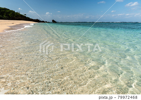 Incredible crystalline turquoise sea with a wavy surface over coral sands. Iriomote Island. Incredible crystalline turquoise sea with a wavy surface over coral sands. Iriomote Island. 79972468