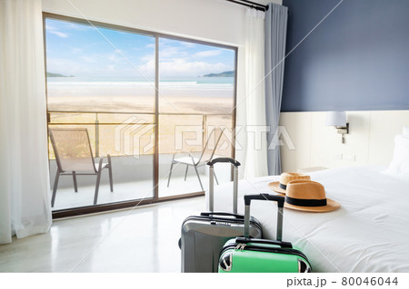 Luxury sea view hotel room with baggage, Travel concept Luxury sea view hotel room with baggage, Travel concept 80046044