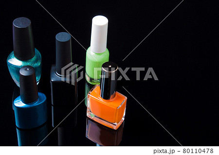 gel Polish for manicure on a white black background isolated, with space. Scattered nail Polish in the beauty salon. The choice of color nail Polish for manicure or pedicure. gel Polish for manicure on a white black background isolated, with space. Scattered nail Polish in the beauty salon. The choice of color nail Polish for manicure or pedicure. 80110478