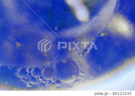 Oil bubbles close up. circles of water macro. abstract light blue background Oil bubbles close up. circles of water macro. abstract light blue background 80122245